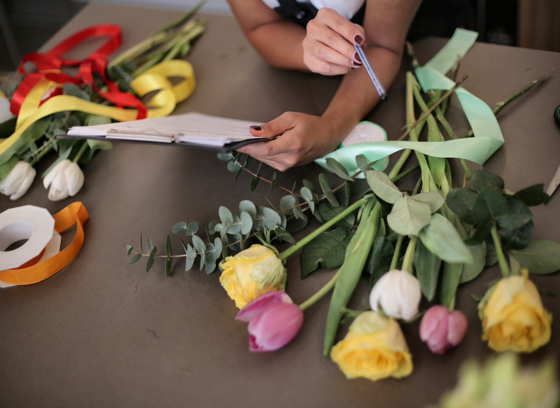 A Variety Of Flowers On Table<br />
